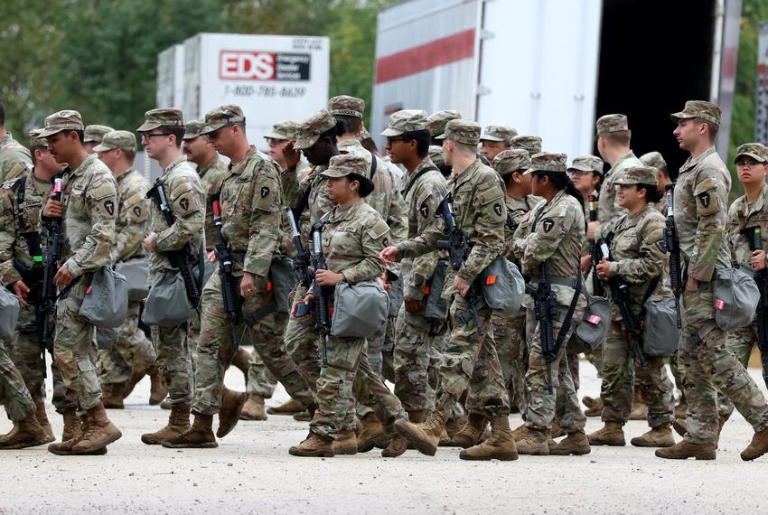 Members of the Texas National Guard assemble in Elwood, Illinois at the Army Reserve Training Center in the southwest suburb of Chicago on October 7 2025.