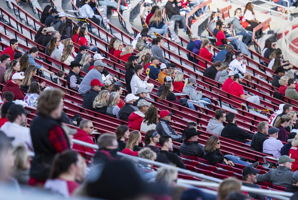 Fans in Jones AT&T Stadium watch Texas Tech's home coming game against West Virginia on Saturday in Lubbock. Texas Tech Athletics has reduced attendance to 25% of the general seating capacity of Jones AT&T Stadium. Oct. 24, 2020.