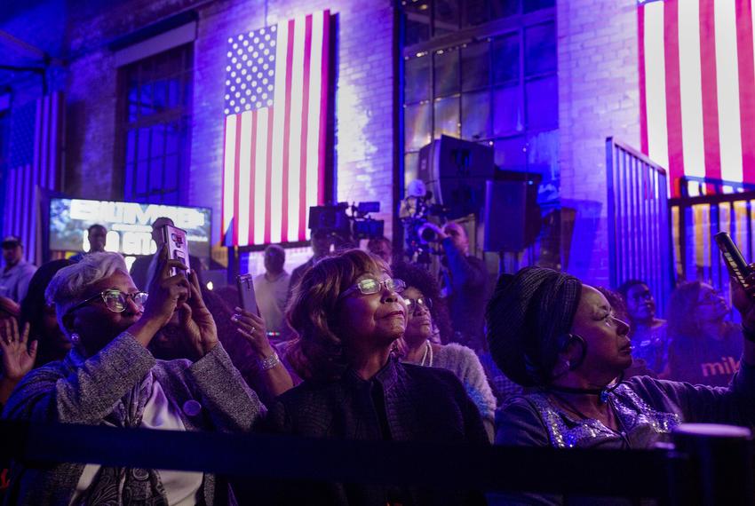 Supporters of democratic presidential candidate Mike Bloomberg gather for a campaign event at the Buffalo Soldier Museum in Houston on Thursday, Feb. 13, 2020.