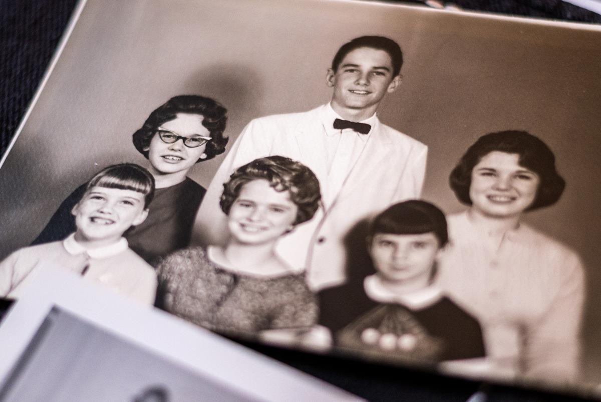 A family photo sits on a table at the home of Beth Pierce in Austin. Cynthia Pierce, back left, died during Winter Storm Uri after the assisted living home she resided in lost power.