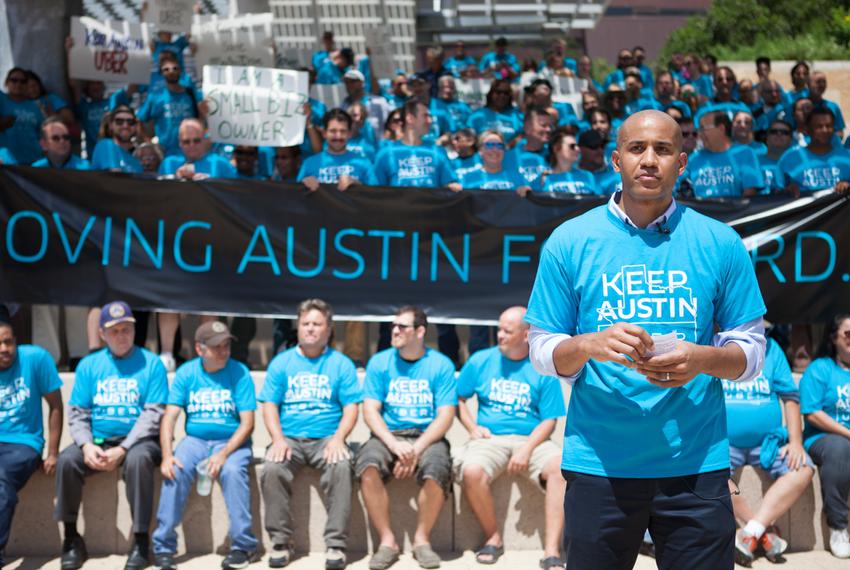 Uber's Austin General Manager, Macro McCottry, leads a march and rally against the proposal set by the Austin Transportation Department. Photos by: Shelby Knowles