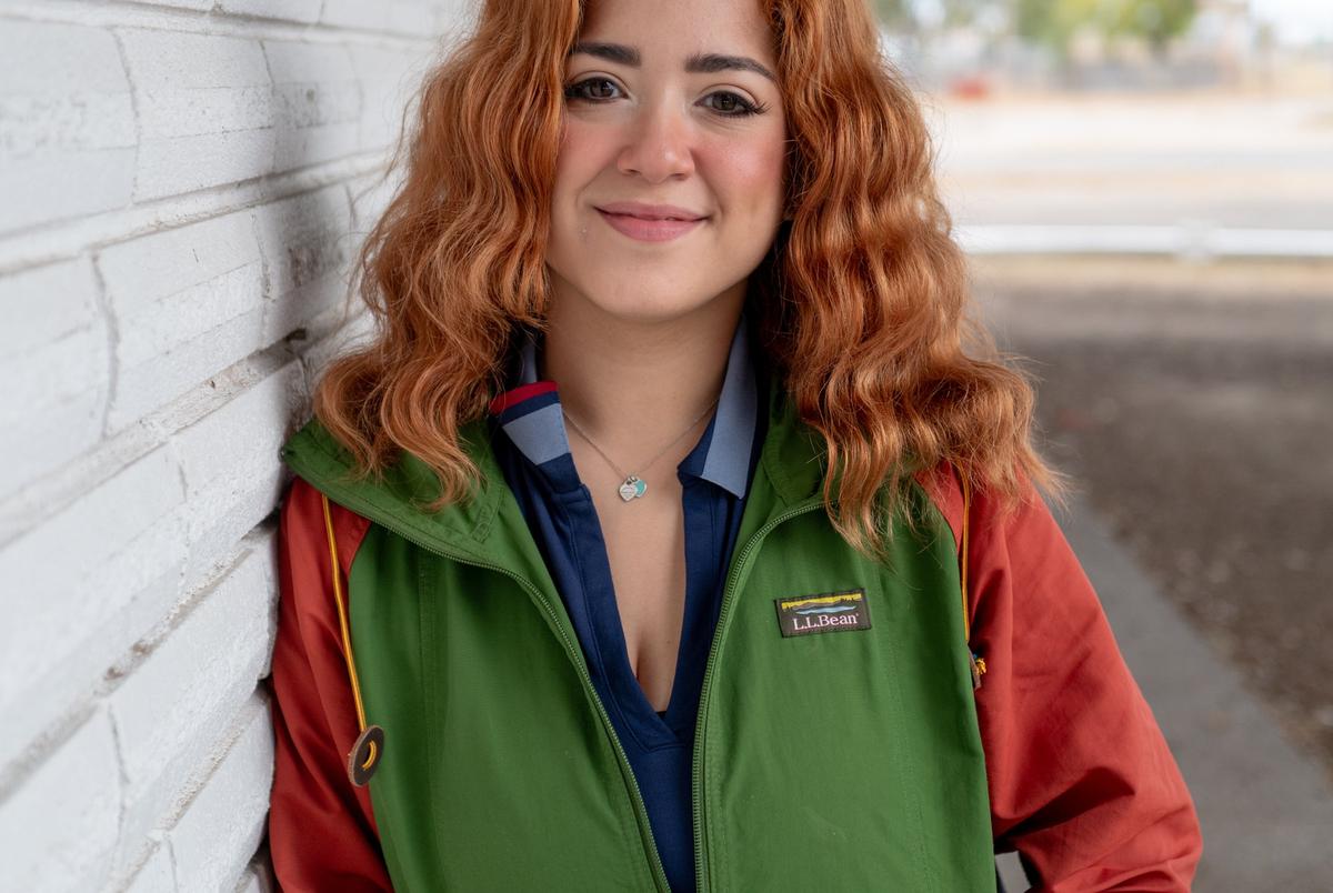 Karen Gonzalez, a local organizer around water issues, poses for a portrait outside a bakery in Del Rio, Texas on Saturday, December 14, 2024.