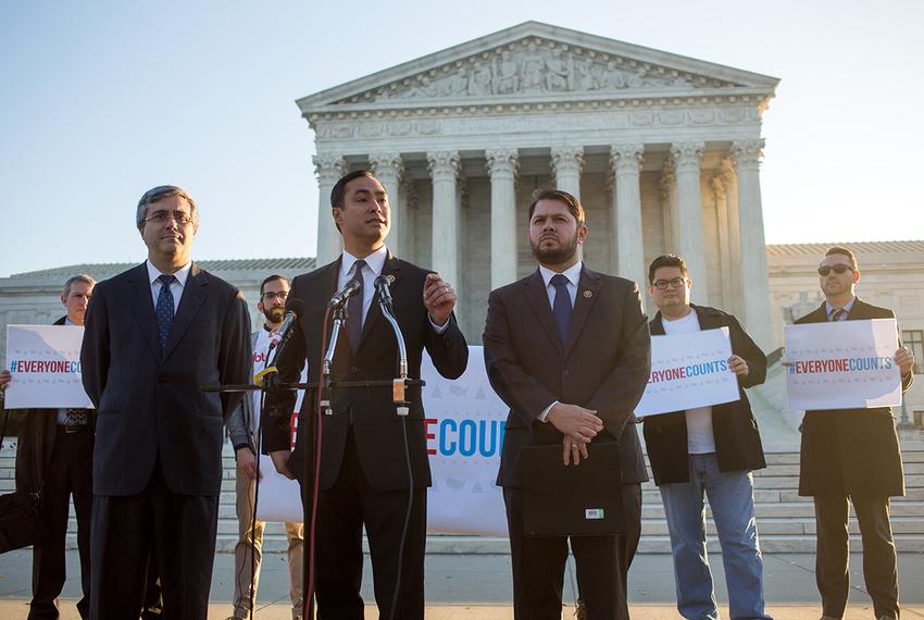 Left to right, Thomas Saenz, President and General Counsel of the Mexican American Legal Defense and Educational Fund, and U.S. Reps. Joaquin Castro (D-TX) and Ruben Gallego (D-AZ) participate in a press conference held by the Congressional Hispanic Caucus in front of the Supreme Court in Washington, D.C., December 8, 2015.  This morning the Supreme Court hears oral arguments on the Evenwel v. Abbott case, on whether voting districts should continue to be drawn by using census population data or whether the system should be changed to count only citizens eligible to vote. (photo by Allison Shelley for The Texas Tribune)