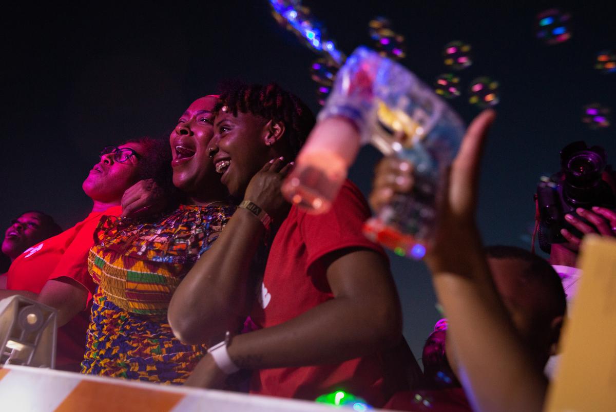 Lisa Smith, Denise Weeks, Latarshia Hall react to Vivian Greenís performance during the I Am Juneteenth festival at the Panther Island Pavilion in Fort Worth on June 19, 2021.