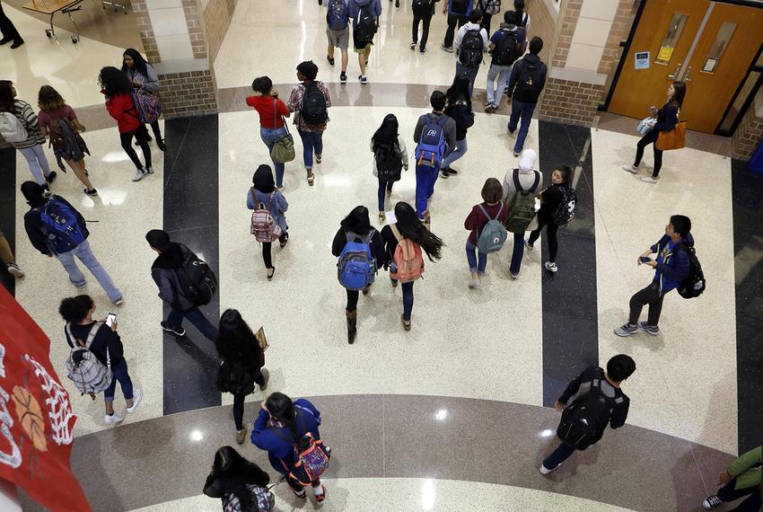 Students crowd the hallway after the last bell rings at Liberty High School in Frisco.