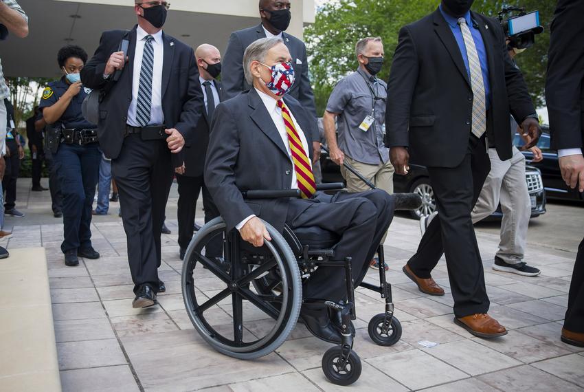 Governor Greg Abbott exits the public memorial service of George Floyd at the Fountain of Praise Church in Houston on June 8, 2020.