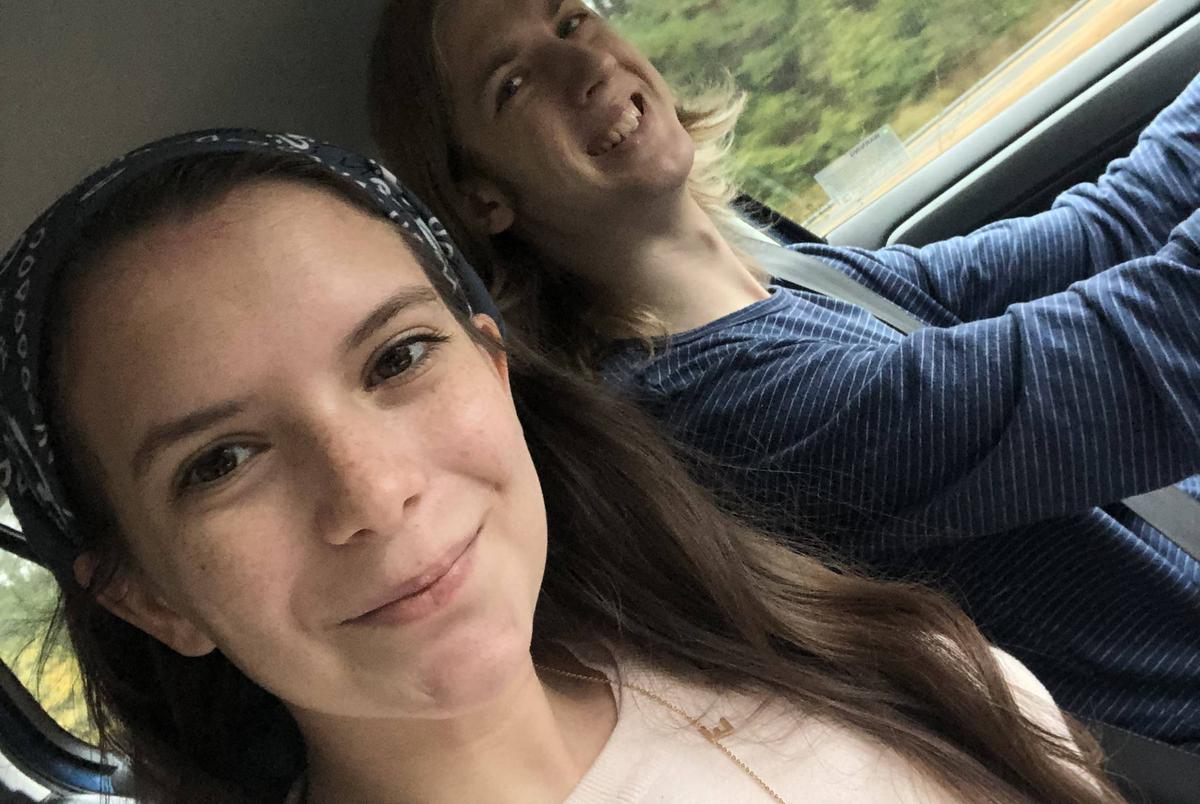 Determined to vote in their home state of Texas, college students Meredith Reilly (left) and Zachary Houdek, both 20, snap a selfie as they drive their rented VW Golf through the southern states on Monday, some 24 hours into a 3,000-mile round trip from American University in Washington D.C. to their homes in Fort Worth and Austin to cast ballots in person after their absentee ballots never showed up. 