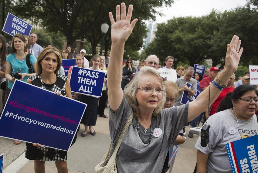 Supporters of the bathroom bill join pastors at a rally at the state Capitol on August 3, 2017. 