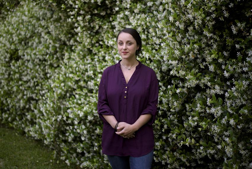 Carly Eaves poses for a portrait at her parent's home on April 15,