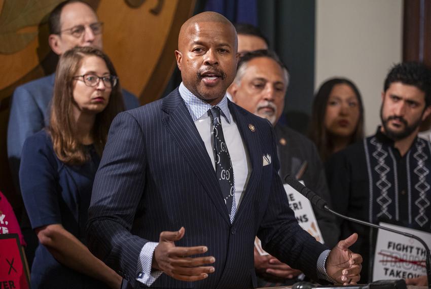 Flanked by members of the Texas Democratic Caucus, state Rep. Ron Reynolds, D-Missouri City, speaks during a press conference at the Capitol in Austin on Monday, July 21, 2025.