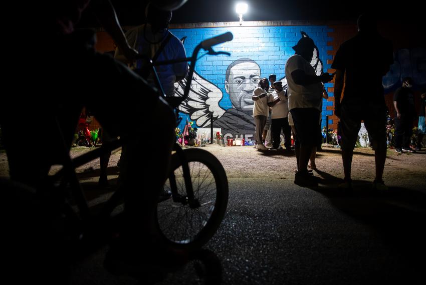 People gather at the mural for George Floyd in the Third Ward in Houston on June 8, 2020.