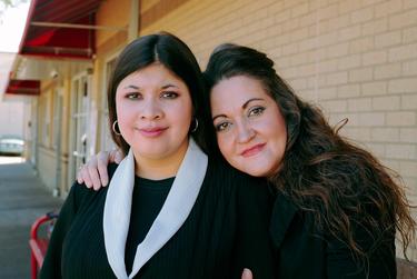 Heather Dillard and her daughter Serena Dillard stand outside the Salvation Army shelter in Denton, Texas.