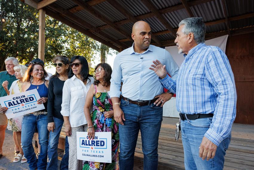 Former U.S. Rep. Colin Allred speaks to a supporter following a town hall meeting in Brownsville on Oct. 3, 2025.