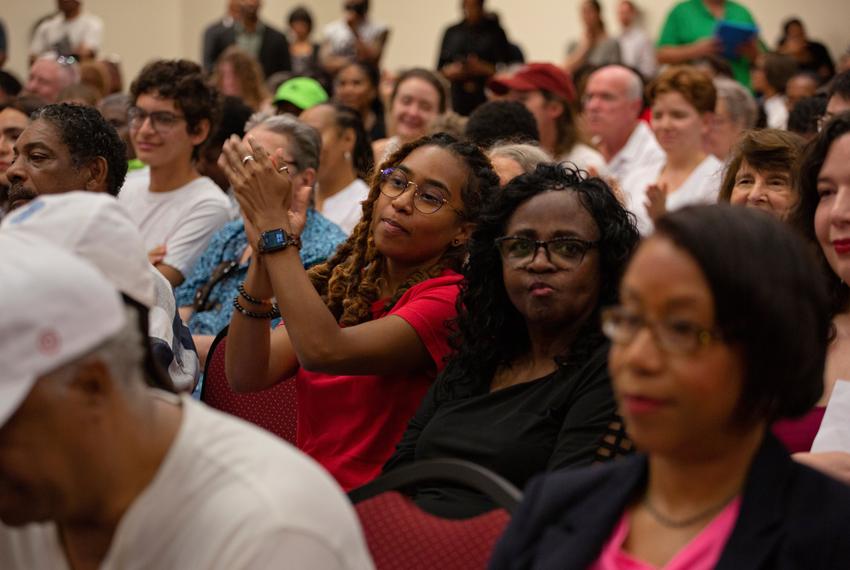 People clap during a Congressional Redistricting meeting at the University of Houston campus in Houston, Texas, on July 26, 2025.