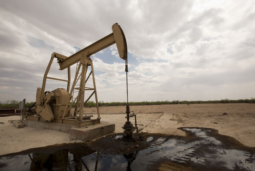 A pumpjack with oil on the ground in Pecos County in West Texas in 2018.