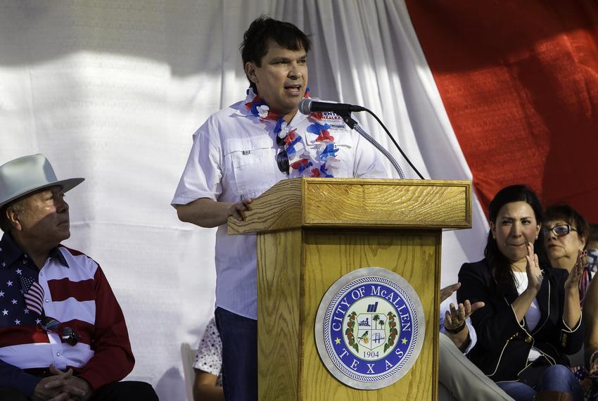 Congressman Vicente Gonzalez speaks to a crowd during the Fourth of July parade in McAllen. 