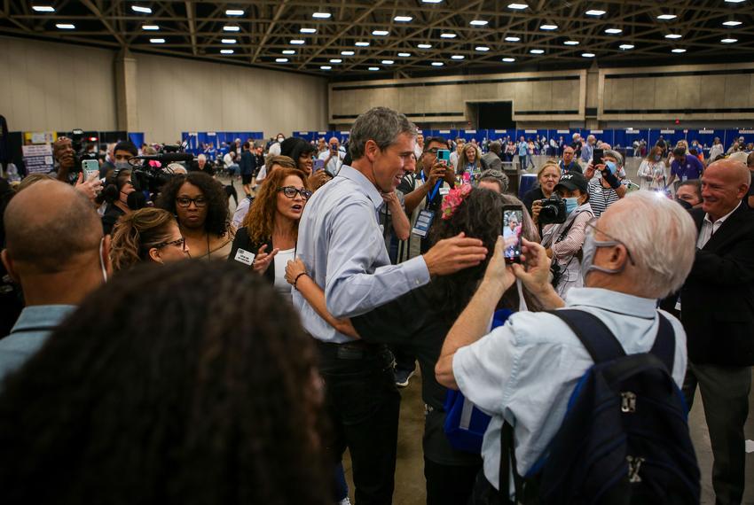 Gubernatorial candidate Beto O’Rourke hugs a supporter during the Texas Democratic Convention at the Kay Bailey Hutchison Convention Center in Dallas on July 15, 2022.