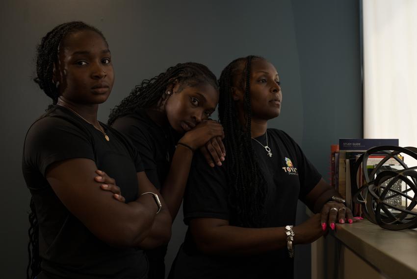 From left, sisters Aniyah, 18, and Erinn, 16, pose for a photo with their mother, Latoya Mayberry on Wednesday, Aug. 6, 2025, in Midland.