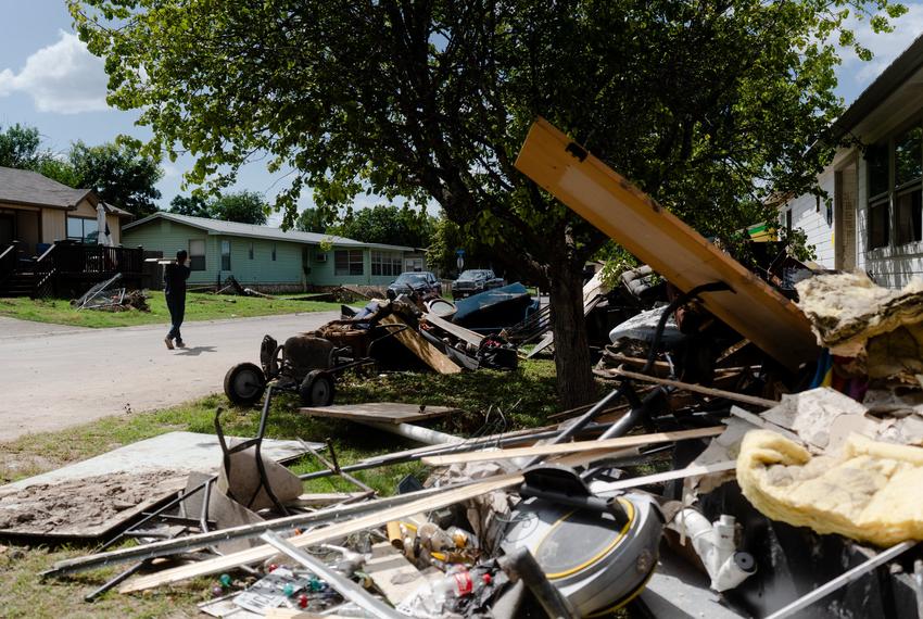 Debris piles up outside a house in Guadalupe Plaza in Kerrville was destroyed by the floods on Thursday July 10, 2025.