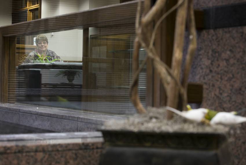 Dorothy Thompson watches the birds in the Moore/Connally Building in College Station on Wednesday, Aug. 13, 2019. Thompson sets out millet as a treat for the birds three times a week and is known around the building as the "treat lady."