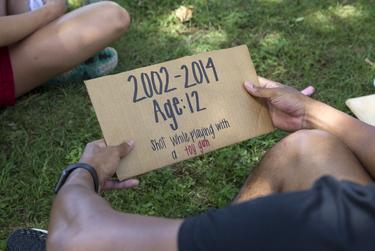 Signs with names of black people who were killed due to police brutality were passed around during a Black Lives Matter protest June 10 at the Hays County Courthouse in San Marcos.