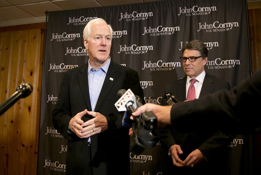 Sen. John Cornyn and Gov. Rick Perry during Cornyn's reelection campaign kickoff in Austin, Texas on November 15th, 2013