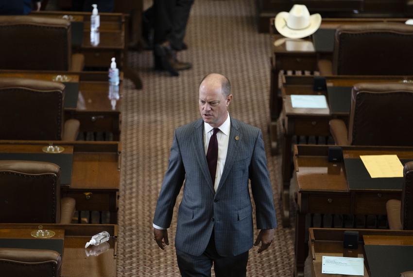 State Rep. John P. Cyrier, R-Lockhart, walks down an aisle on the House floor on July 20, 2021.