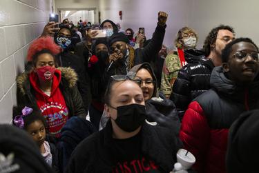 Christopher A. Williams-Watkins, center, leads a chant demanding justice in the Collin County Jail halls on March 18, 2021, for his friend, Marvin Scott III, who died while in custody at McKinney. Christopher said Marvin was a fun and bubbly guy and that “he definitely was able to go in multiple rooms and leave a great impression no matter the crowd. [He was] never aggressive. That’s why this is so sad, that this would happen to someone like this.”