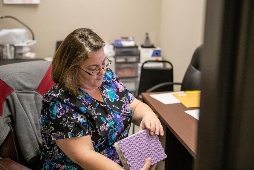 Kristal Macaluso, phlebotomist at Western Hills Clinic, reorganized medical supplies, Monday March 11, 2019. The clinic is a part of Tarrant County MHMR and serves low income clients with behavioral health and substance abuse needs.