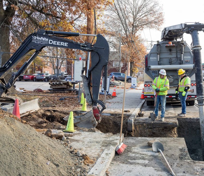 Workers install a main pipe in the community geothermal system in Framingham, Mass., in 2023. The pilot project is designed to serve 140 residential and commercial customers, replacing natural gas to heat and cool the buildings. It is considered the first utility-owned geothermal system in the country.