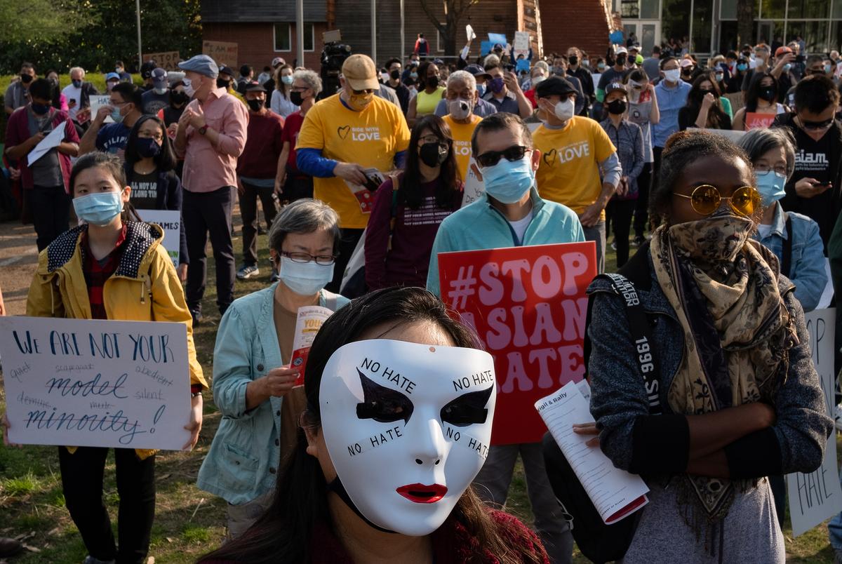 Janet Blancett, center, at Discovery Green on March 20, 2021, in Houston. People gathered for the Stop Asian Hate Vigil and Rally after a man killed eight, including six Asians, in a mass shooting at three Atlanta spas.