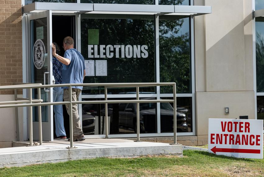 Voters enter the polling place on Election Day at the Hays County Government Center in San Marcos on Nov. 2, 2021.
