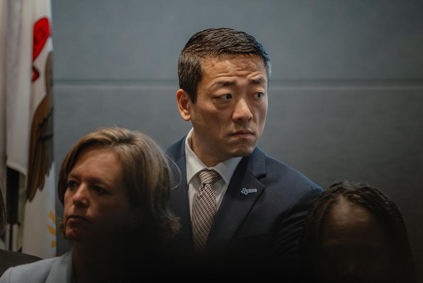 Democratic Texas Rep. Gene Wu listens to speakers during a press conference with members of the Texas House Democratic Caucus at IBEW Local 701 in Warrenville, Ill., on Monday, Aug. 4, 2025.