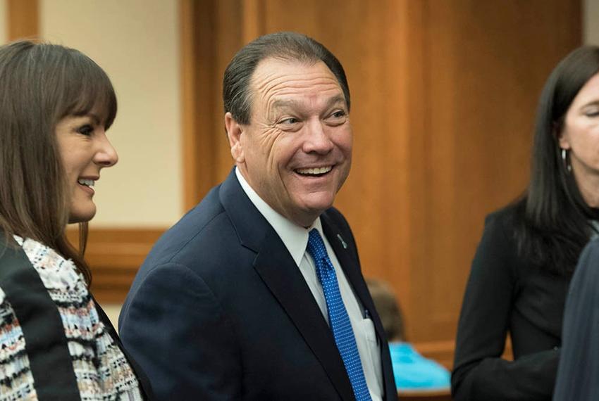 Henry "Hank" Whitman, new head of the Dept. of Family and Protective Services, greets visitors to the House Committee on Human Services July 12, 2016 prior to his testimony on his vision for reform at the agency.