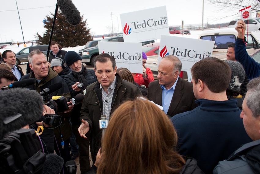 U.S. Sen. Ted Cruz speaks to members of the press before a campaign speech at Kings Christian Bookstore in Boone, Iowa, on Jan. 4, 2016. Cruz kicked off a six-day, 28-county bus tour across Iowa in a push to reach out to voters before the state's first-in-the-nation caucus on Feb. 1.