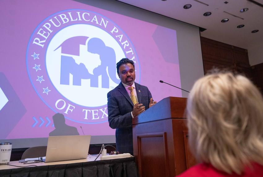 Republican Party of Texas Chairman Abraham George talks with a delegate during the State Republican Executive Committee (SREC) special-called meeting to discuss censures of several Republican House members including Speaker Dustin Burrows, at the Texas Capitol, on Oct 11, 2025.