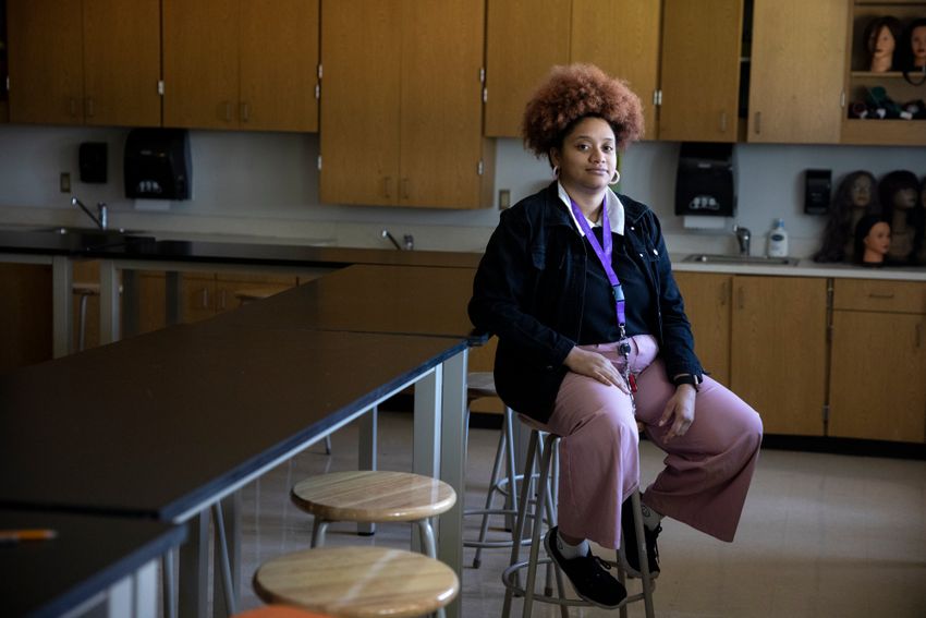 AUSTIN, TEXAS - July 23, 2025: Tatiana Brown-Gomez, a former teacher at Dobie Middle School, poses for a portrait inside Dobie Middle School. Austin Voices for Education and Youth, hosts a summer camp at the Dobie Middle School for students that attend the three Austin ISD schools at risk of closure. Ilana Panich-Linsman for The Texas Tribune