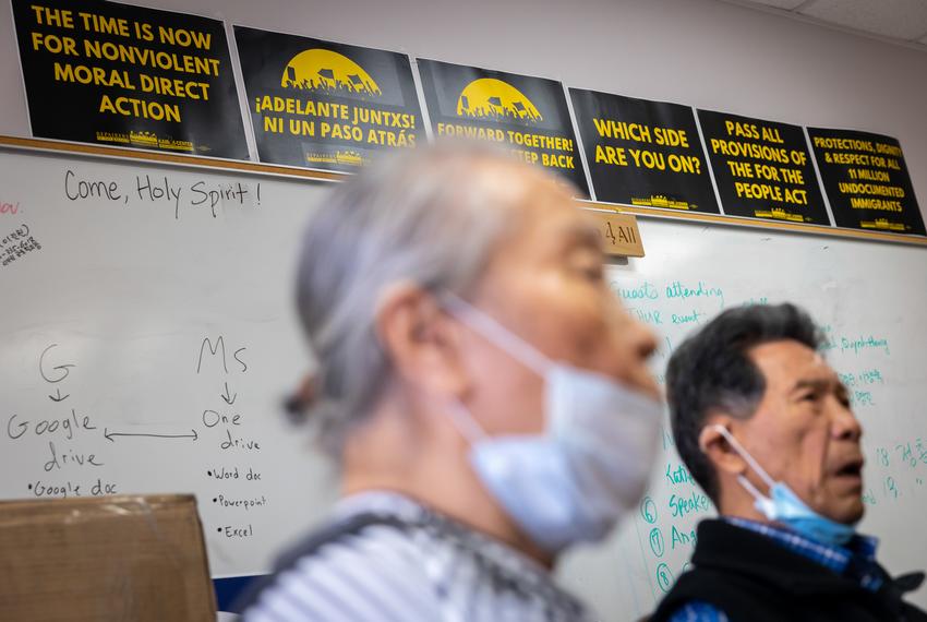 Activist signs line a large whiteboard in the office of Woori Juntos, an immigrant advocacy organization headquartered at the Korean Community Center in the Spring Branch district of Houston, TX, on Thursday, Feb. 23, 2023.