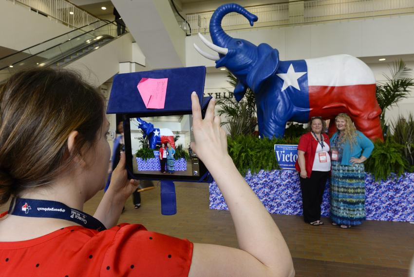 Republicans posing with the elephant at the Fort Worth Convention Center on June 5, 2014.