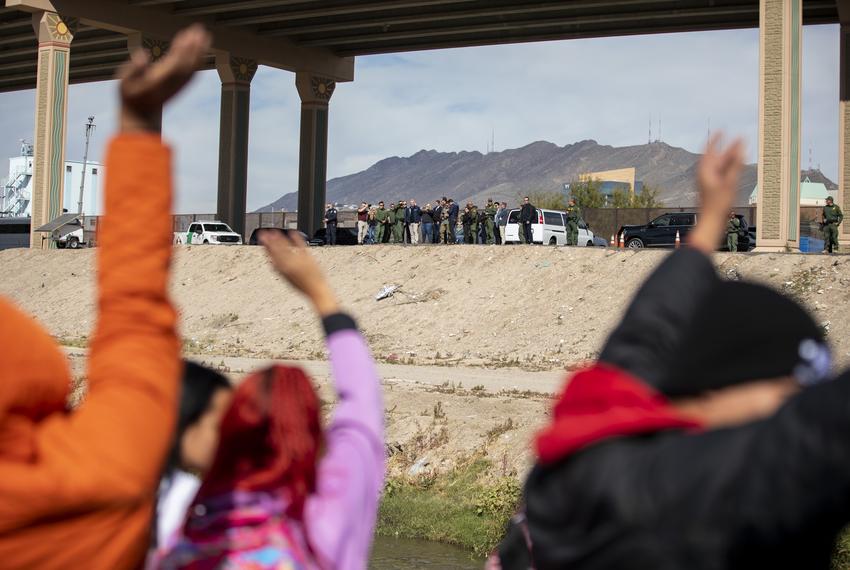 A group of migrants, many staying in tents right along the river in Ciudad Juárez, waved their arms at McCarthy, some shouting, “let us in,” or “we want to work.”