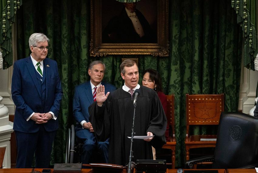 Lt. Gov. Dan Patrick and Gov. Greg Abbott look on as Chief Justice of the Supreme Court of Texas Jimmy Blacklock swears in state senators during the opening of the Texas Senate in Austin on Tuesday, Jan. 14, 2025.
