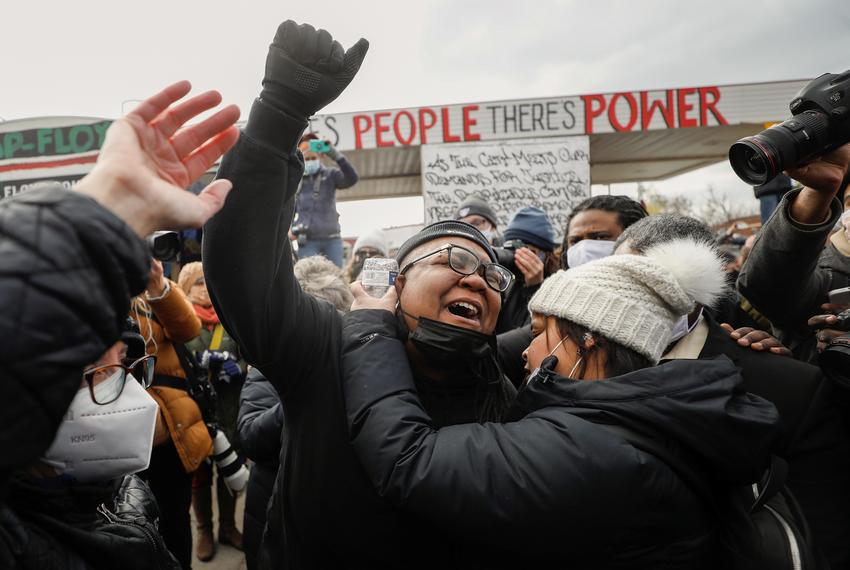 People react after the verdict in the trial of former Minneapolis police officer Derek Chauvin, found guilty of the death of George Floyd, at George Floyd Square in Minneapolis, Minnesota, on April 20, 2021.