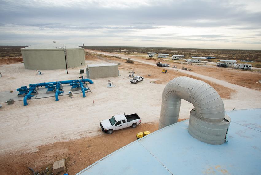 Construction finishing on a two million gallon water tank in a 13,000-acre water well field owned by the Colorado River Municipal Water District near Wickett, Texas. The land and existing infrastructure, purchased from Luminant Generation using state funds, as well as newly constructed water wells and pipeline, can pump up to 30 million gallons of water out of the field a day.