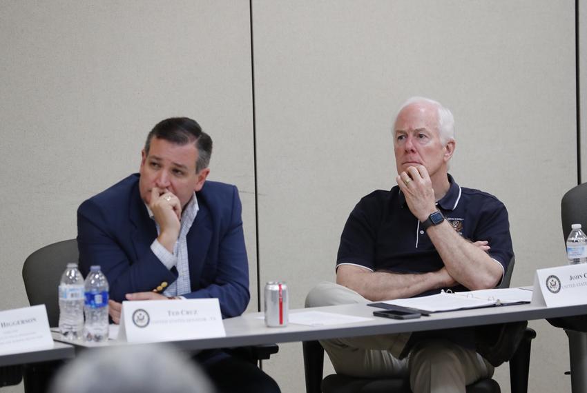 U.S. Sens. Ted Cruz (left) and John Cornyn listen at a a roundtable discussion at a South Texas border patrol station in Weslaco on June 22, 2018.