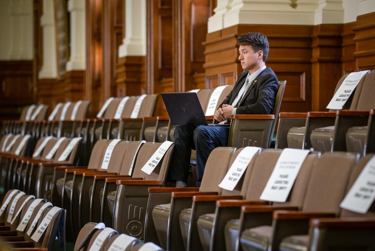A man watches from the Senate gallery during session at the state capitol on May 25, 2021.