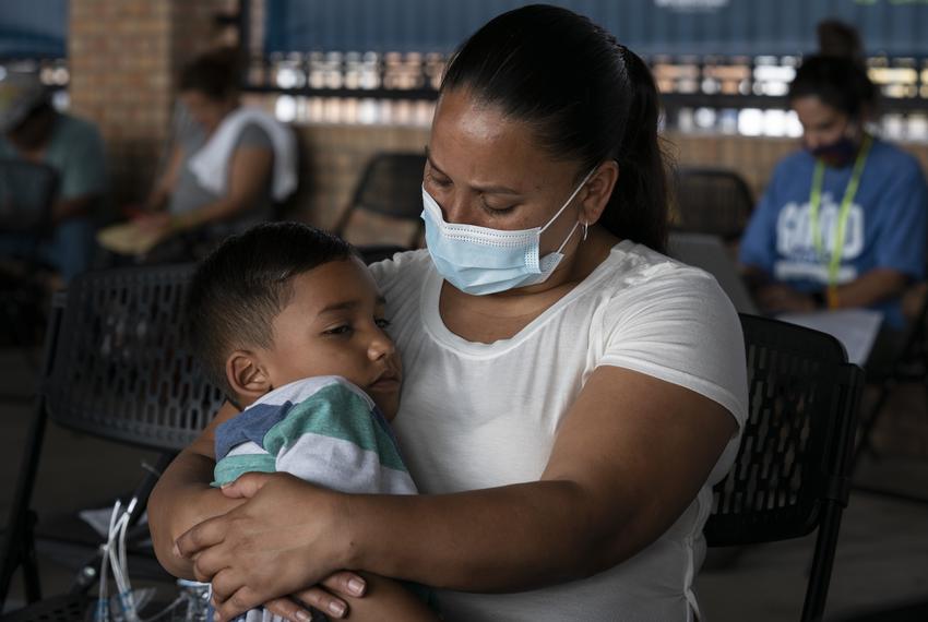 Venezuelan asylum seeker Jhinezka de Arias holds her son Cristhofer at the bus station in Brownsville, Texas, on Feb. 25.