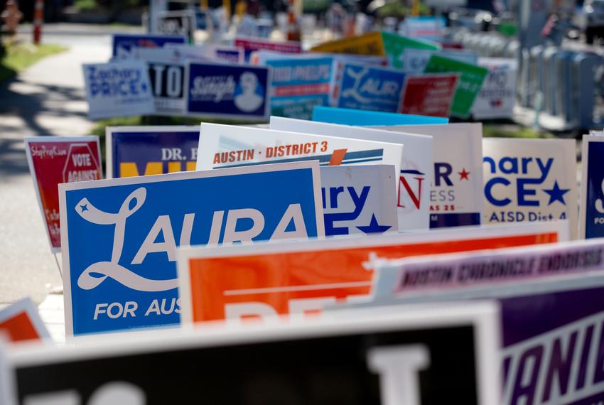 Political campaign signs outside of the Carver Branch Library in Austin on the last day of early voting in Travis County.