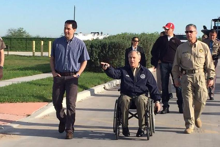 Texas Gov. Greg Abbott and Wisconsin Gov. Scott Walker tour the U.S.-Mexico border Friday. Walker is a likely 2016 presidential candidate.