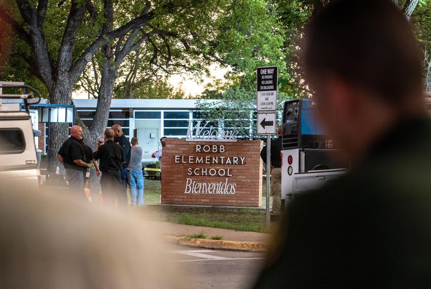 Police block off the road leading to the scene of a school shooting at Robb Elementary on Tuesday, May 24, 2022 in Uvalde, TX. A school shooting was reported this afternoon after a high school student opened fire inside Robb Elementary School where two teachers and 14 students were killed.