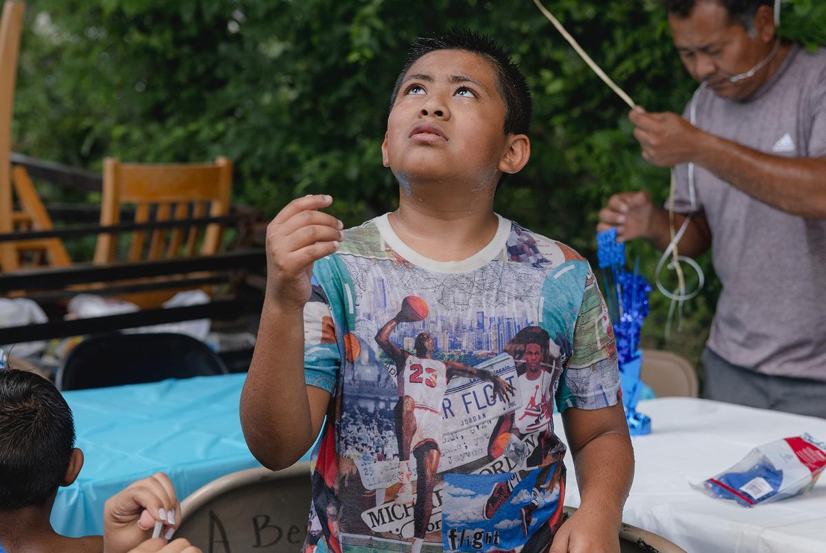 The Ávila family celebrate Jeremiah’s birthday with a waterslide in José’s backyard, Friday, June 6, 2025, in Houston. 

(Lexi Parra for The Texas Tribune)